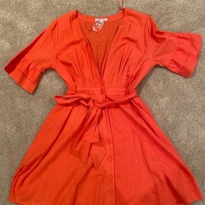 Fashion Nova Peach low cut dress.